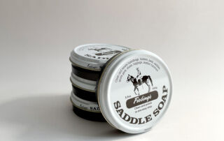 stack of saddle soap on white background