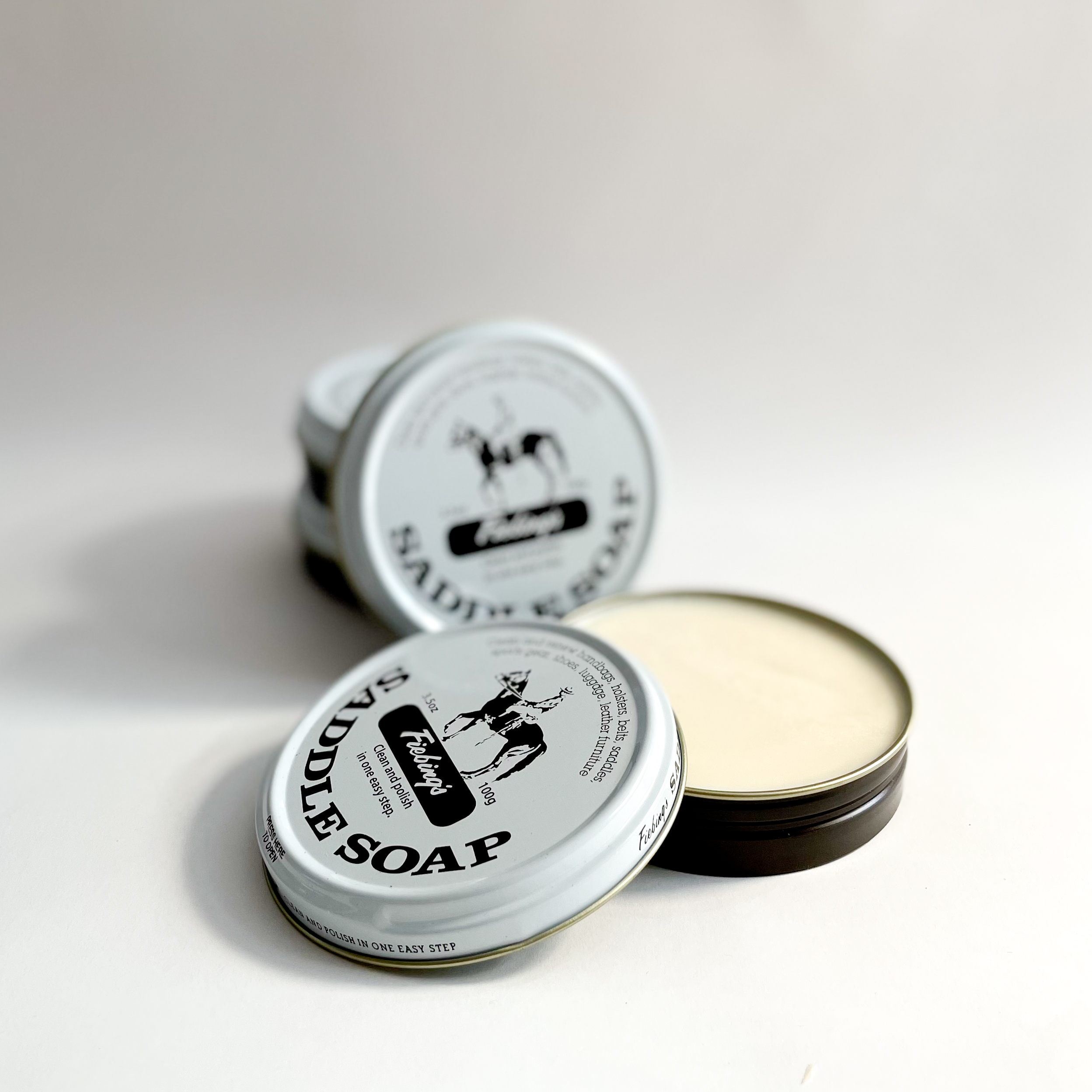 Saddle soap, open can, on a white background